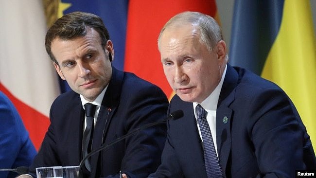 俄罗斯总统普京与法国总统马克龙。（路透社2019年12月9日）