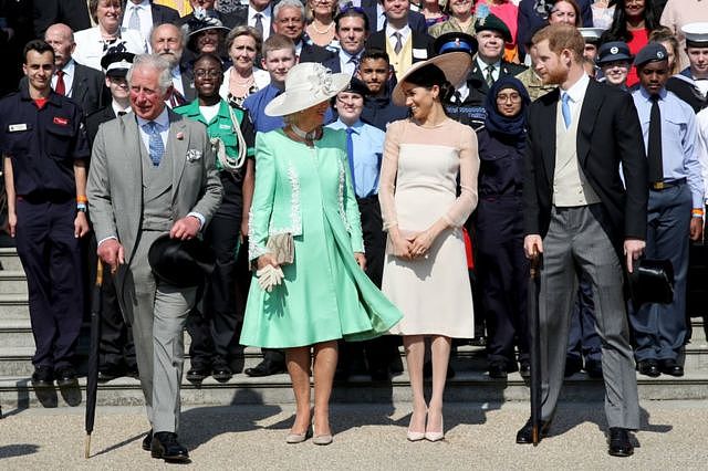 查尔斯三世国王、王后、哈里王子、梅根·马克尔 2018年5月22日在白金汉宫庆祝查尔斯三世 70岁寿辰。