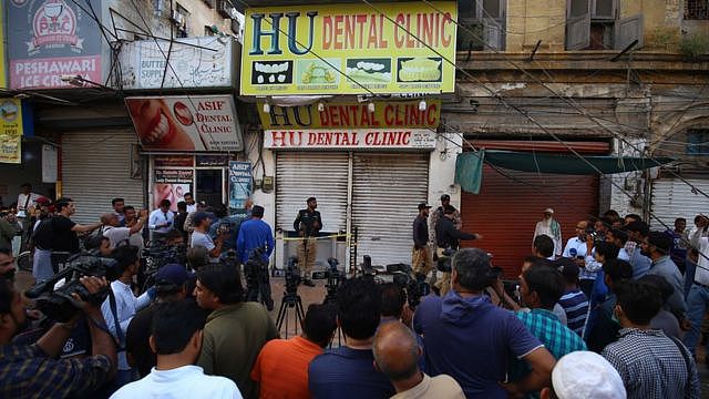 巴基斯坦卡拉奇警方在牙医诊所现场搜查。