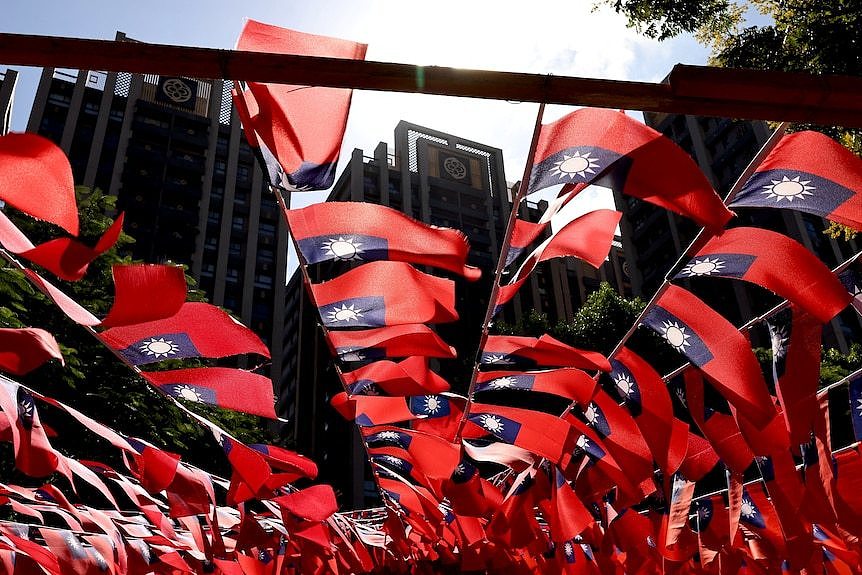 Taiwanese flags wave at a park.