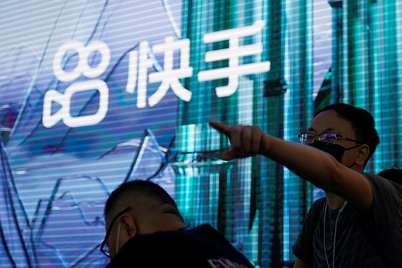 2021 年 7 月 30 日，在线视频服务运营商快手科技的标识在上海举行的数字娱乐博览会暨大会。（路透社）