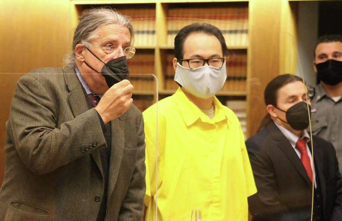 FILE PHOTO: Qinxuan Pan, accused of the slaying of Yale graduate student Kevin Jiang, appears in court Tuesday Oct. 12, 2021 with his attorney, Norm Pattis. Pan was found competent in a hearing in New Haven Monday. 