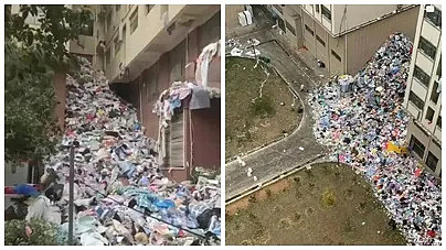网传员工来不及带走的家当全被当作垃圾丢下楼，甚至堆到2层楼高。 翻摄微博