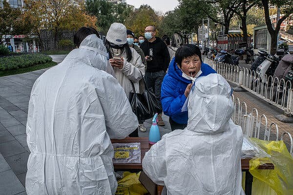 People lined up for required Covid tests in Beijing this week.