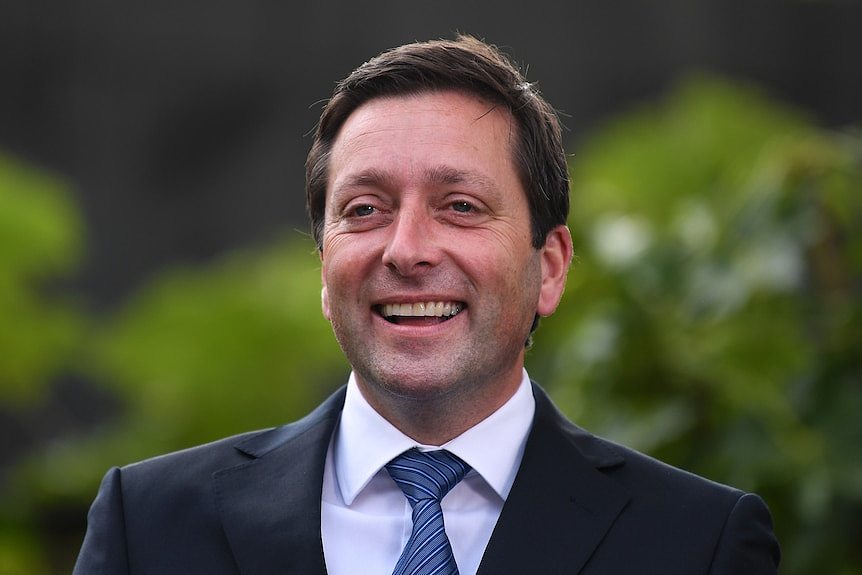 Matthew Guy smiles during a press conference