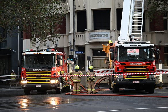 Firefighters at the scene of a fire in Melbourne in May.