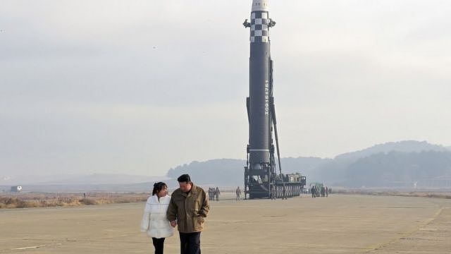 Kim Jong with his daughter