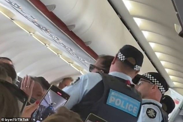 Passengers can be heard chanting and laughing as the Lennox Heads woman was kicked off a plane flying from the Gold Coast to Avalon on Monday (pictured)