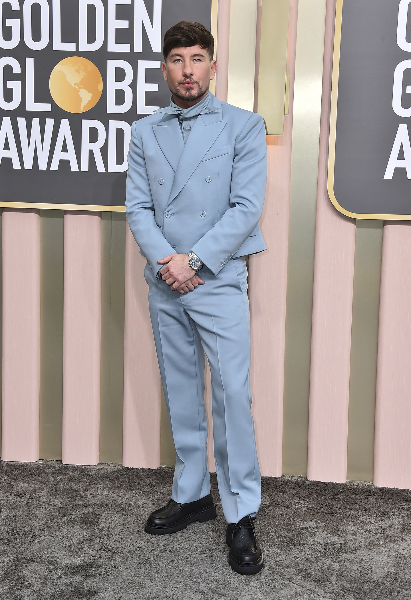 Barry Keoghan wearing a light blue suit over the top of a shirt in the exact same shade of blue. 