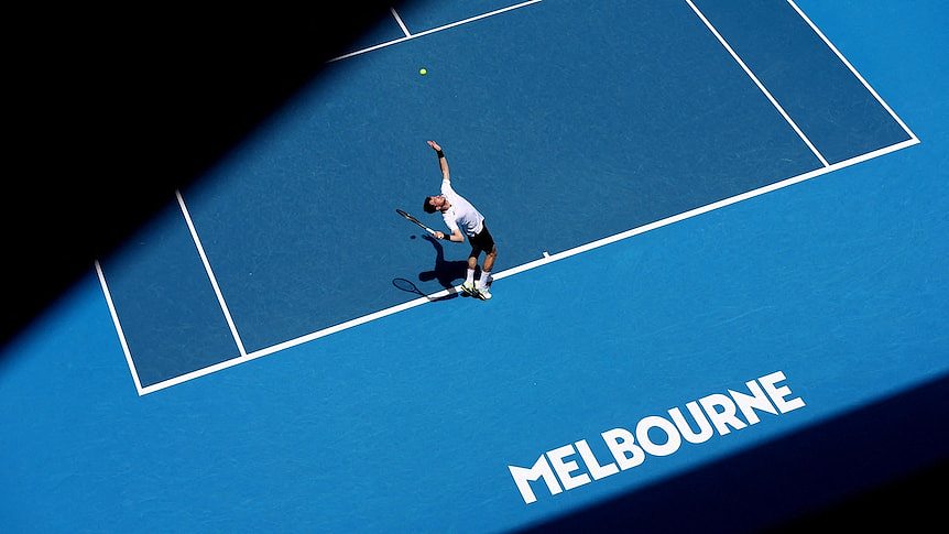 a man playing tennis