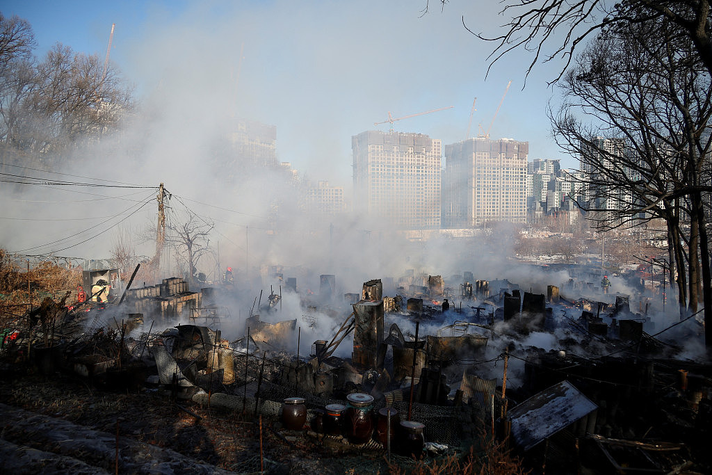 火灾现场是南韩最大贫民窟。路透社 