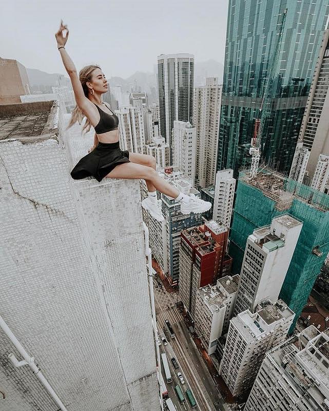 29岁俄罗斯美女挑战高空拍照走红，在“世界第二高楼”上翩翩起舞（组图） - 9