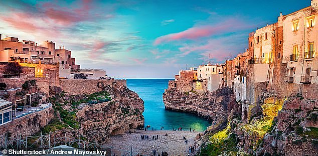 Polignano a Mare in Italy (pictured) was ranked the most welcoming on earth. It is the second year in a row that a city in Italy has taken out the top spot