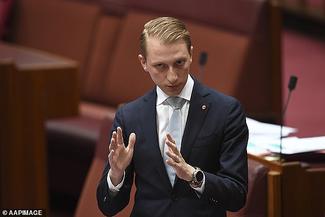 Liberal senator James Paterson (pictured) has urged all Australian Government departments to 'rip out' Chinese-made security cameras