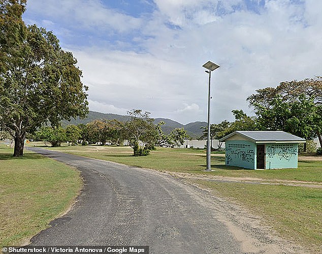 A young woman was so severely injured in an attack by three dogs in Yarrabah (pictured) she had to be flown to hospital