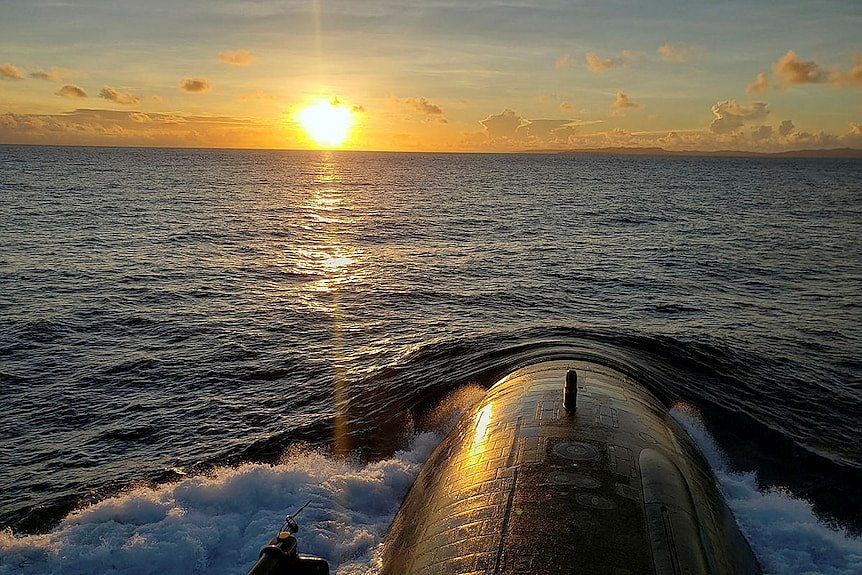 A submarine going underwater, and a sunset.