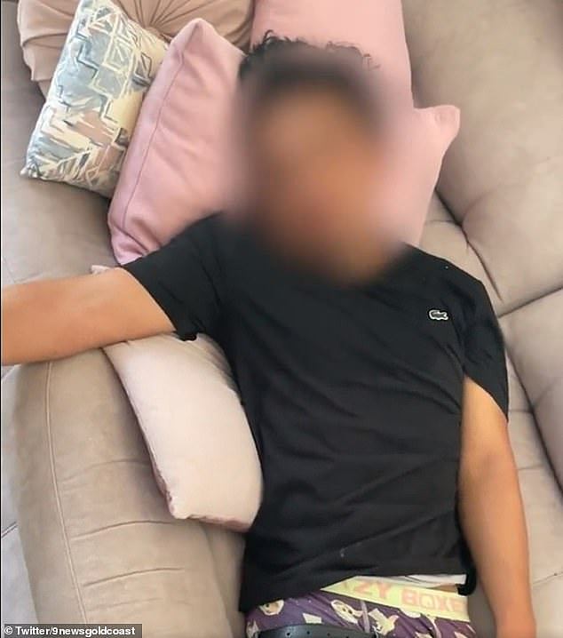 A Coomera family woke up to find a surprise gatecrasher sleeping on their sofa