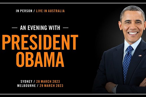 An advertisement for former US president Barack Obama tour with him smiling in a tie.