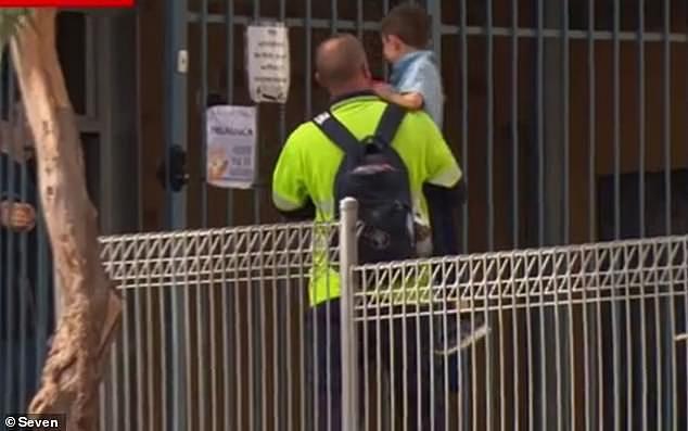 Harry (pictured), eight, was trapped inside a school bus for up to an hour in Adelaide