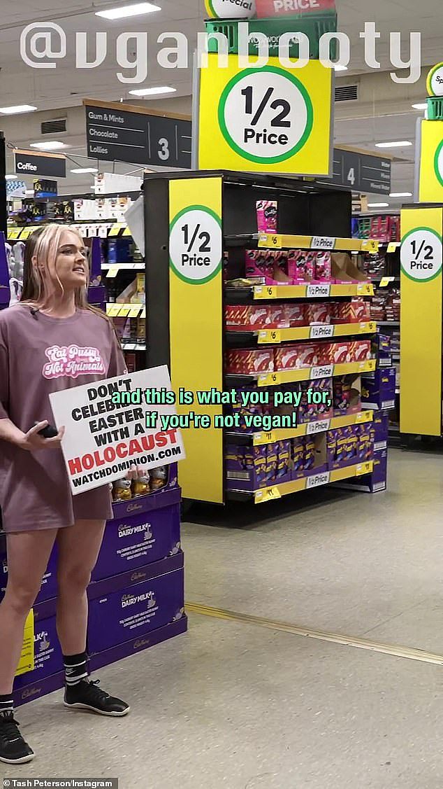 Holding up a sign that read: 'Don't celebrate Easter with a Holocaust' Ms Peterson told shoppers they are 'complicit in rape' if they consumed dairy milk chocolate eggs