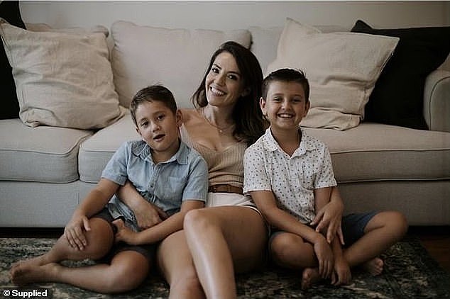 Elle Gencer, pictured here with her sons, developed salon quality, DIY facial tools after realising she wouldn't be able to go back to fortnightly spa visits after having kids