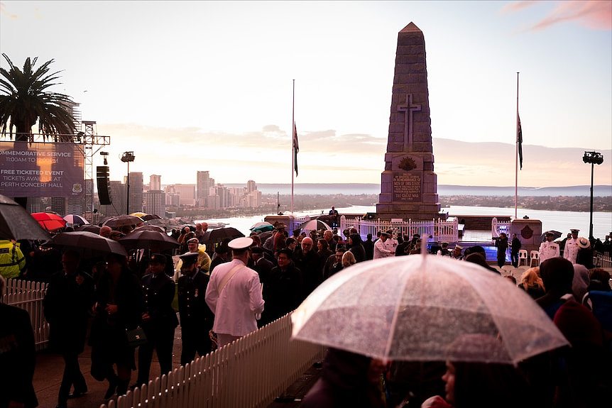 People watching an Anzac Day dawn service in Perth.