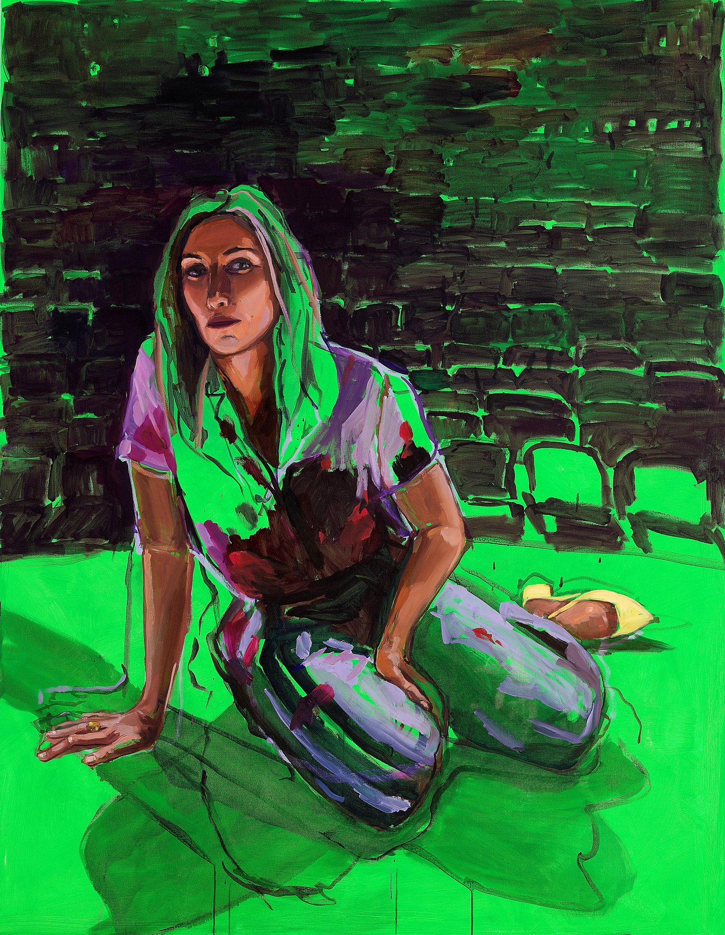 A vivid green semi-realistic portrait of Claudia Karvan, a middle-aged white woman with long hair, seated on a theatre stage.