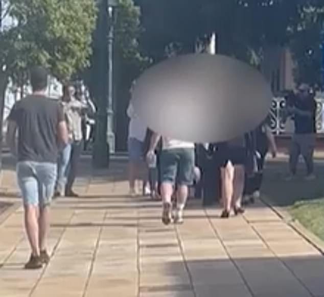 The parents (above) of a 13-year-old Bundaberg boy who is accused of causing the three-car crash that killed three women and critically injured another were heckled at after leaving their son's court appearance on Tuesday