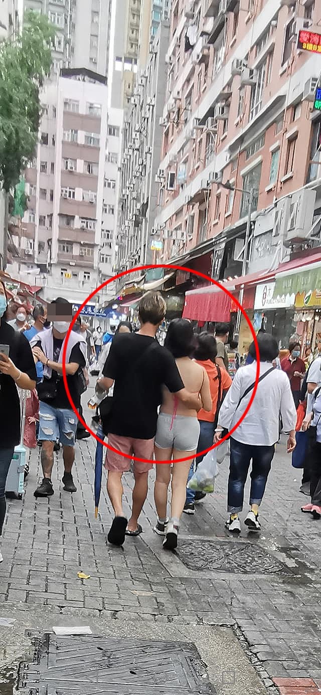 令人震惊！香港一名女子仅穿肚兜和短裤，任由男子摸私密部位（组图） - 2