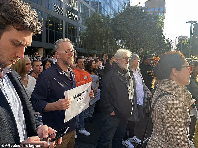 ABC staff (pictured) staged a walk-out in solidarity with Q&A host Stan Grant on Monday afternoon