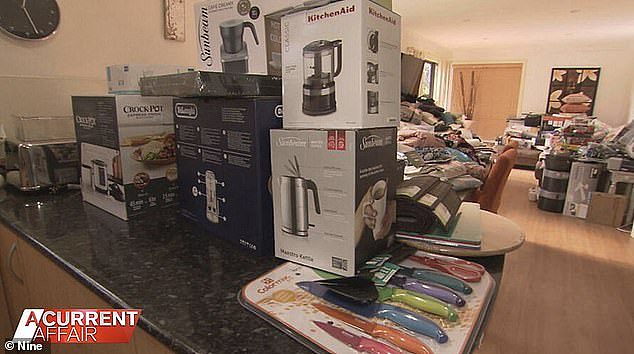 A 'shopaholic' hoarder filled an almost decade long hole in her life by buying things she neither needed nor wanted (pictured)
