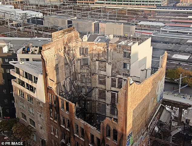 Mr Campbell was displaced from his studio apartment last Thursday after a blaze ravaged the neighbouring heritage-listed building in Surry Hills (pictured, the aftermath)