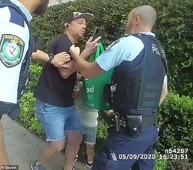 Mr McIvor (pictured with Maleckas moments before the attack) had called for police after a group of 'eshays' threatened him Castle Hill metro station in north-west Sydney