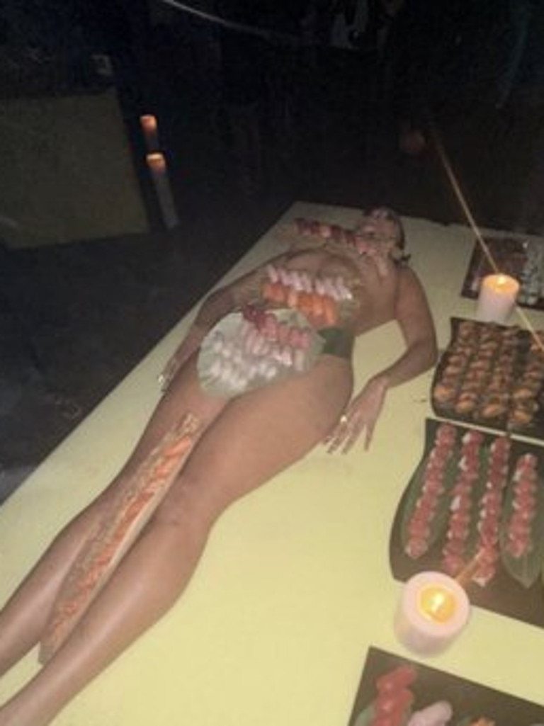 Sushi served atop a model at Kanye's birthday.