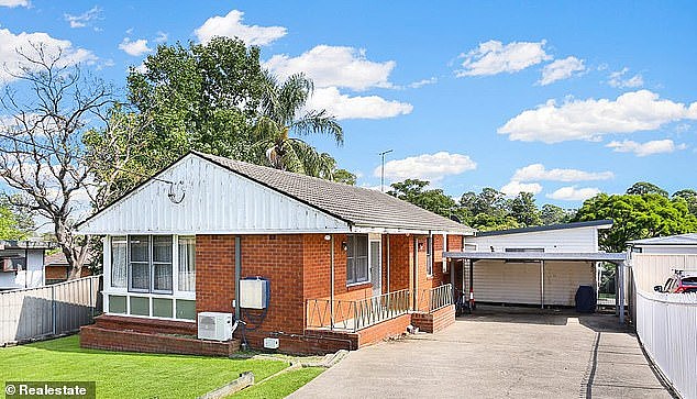 Houses are attainable for an average-income earner in less than half a dozen suburbs of Australia's most expensive city (pictured is a house at Tregear that sold for $620,000 in May, a level slightly above the suburb median of $607,393)