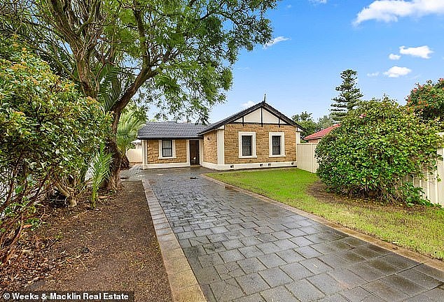Renting is also more expensive than paying off a typical mortgage in the northern Adelaide suburb of Elizabeth (pictured is a two-bedroom house that has sold for $325,000)