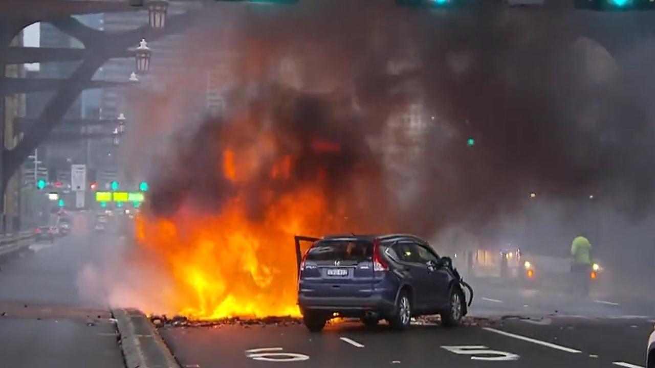 Christopher Walker, 19 at the time, was allegedly driving a Toyota Kluger that crashed and burst into flames on the Sydney Harbour Bridge. Picture: 9 News