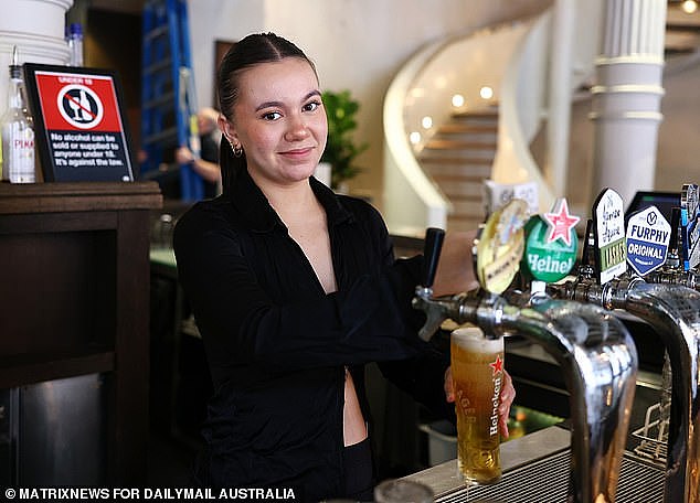 May's jobless rate of 3.6 per cent is at a near 48-year low but the RBA is expecting it to reach 4.5 per cent by the end of 2024 (pictured is a bartender in Sydney)
