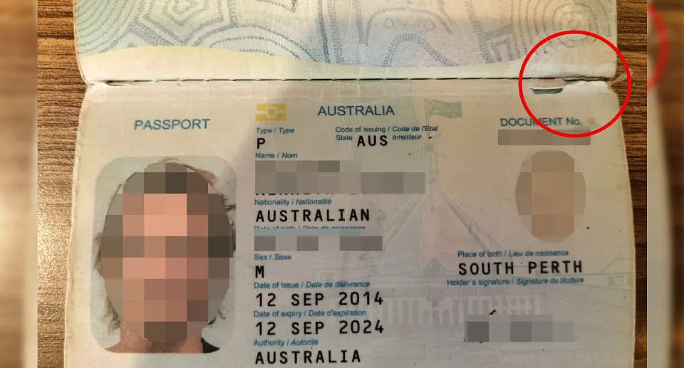 Mike's passport can be seen with the passport detail highlighted by a red circle. 