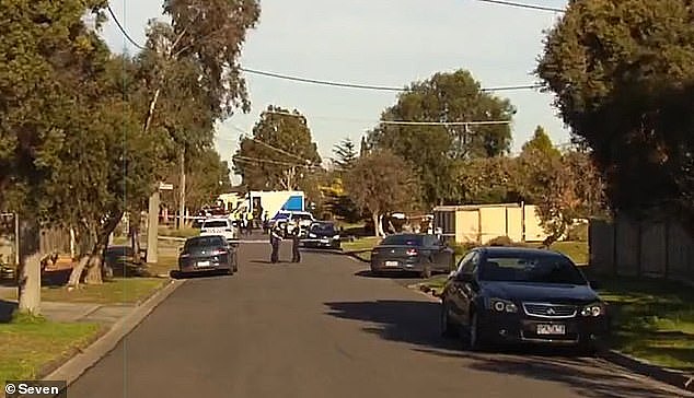 Crime scene tape has been set up on opposite ends of Grevillea Crescent on Hoppers Crossing and several emergency vehicles including a police van are already on the scene