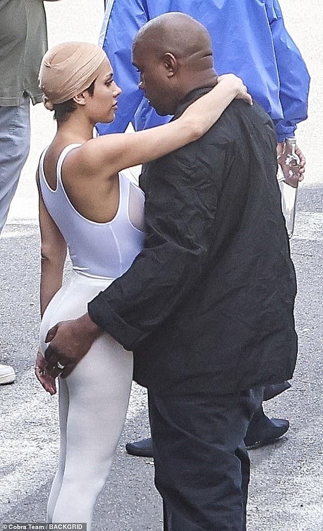 Enthralled: The 46-year-old rapper — who just performed with Travis Scott — was spotted admiring his much younger love, 28, as she continued her run of eye-catching looks in a sheer white spandex look