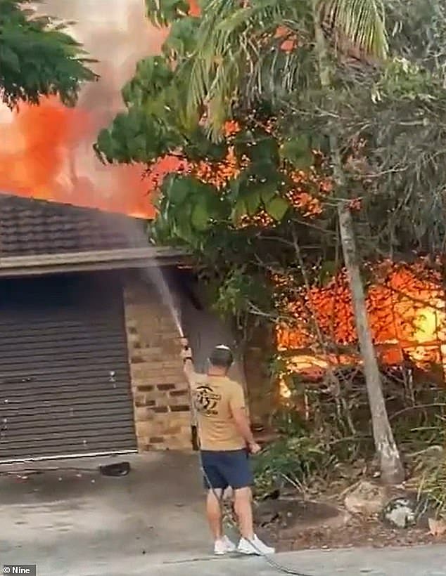 Neighbours tried to save the Coomera home engulfed in flames until firefighters arrived