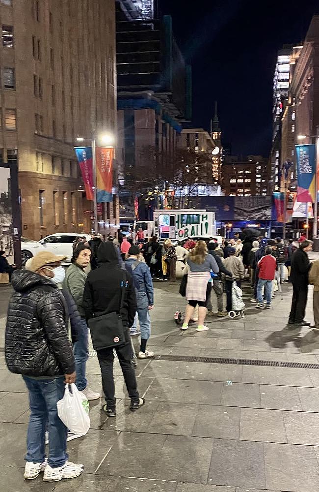 Large queues on Martin Place as people wait in line for clothes. Picture: Pass it on Clothing & Co/Facebook