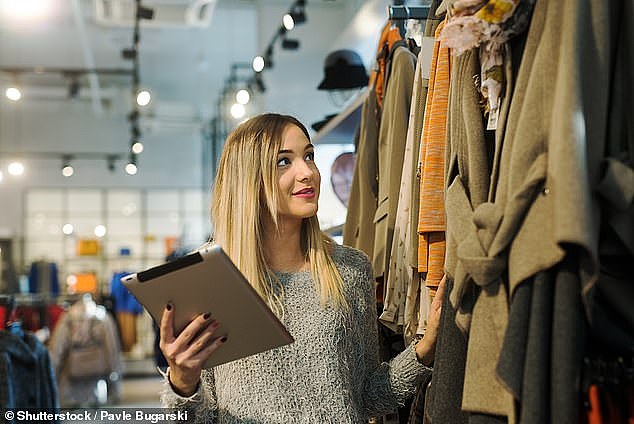 More than 100,000 full-time sales assistant roles could be slashed by 2027 due to AI (stock image)