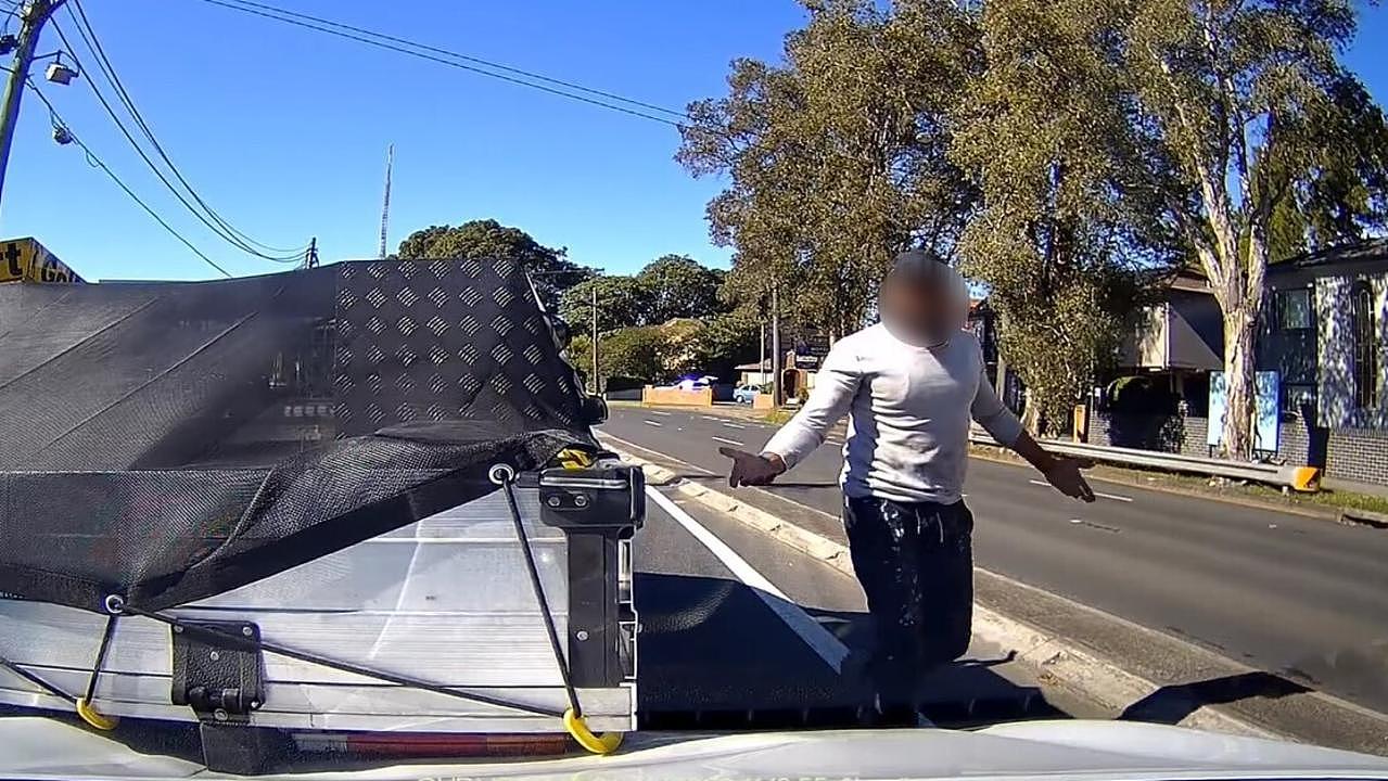 The two tradies got out for some peacocking. Picture: Dashcam Owners of Australia/ Facebook