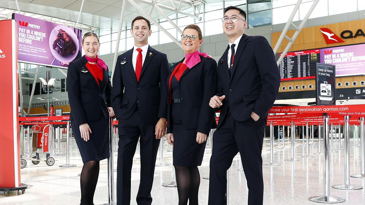 Pictured at Qantas Domestic Terminal in Sydney are Qantas employees, Rebecca Wilson, Scott Abdul Latif, Michelle Chadwick and Michael Charles Remon. Qantas staff will be gifted 1000 shares as a bonus for the company being in profit. Picture: Richard Dobson