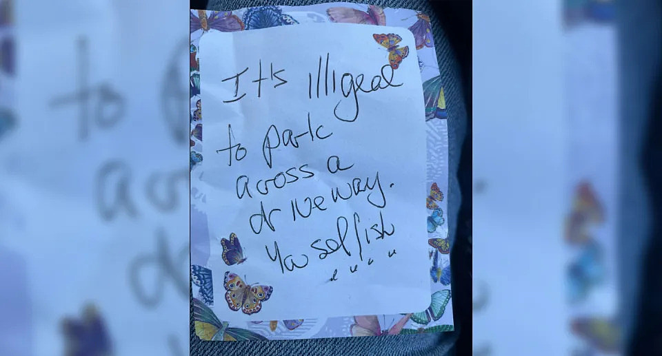 The angry note can be seen handwritten on a butterfly sticker. 