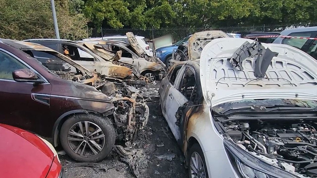 The blaze gutted five vehicles in the carpark.