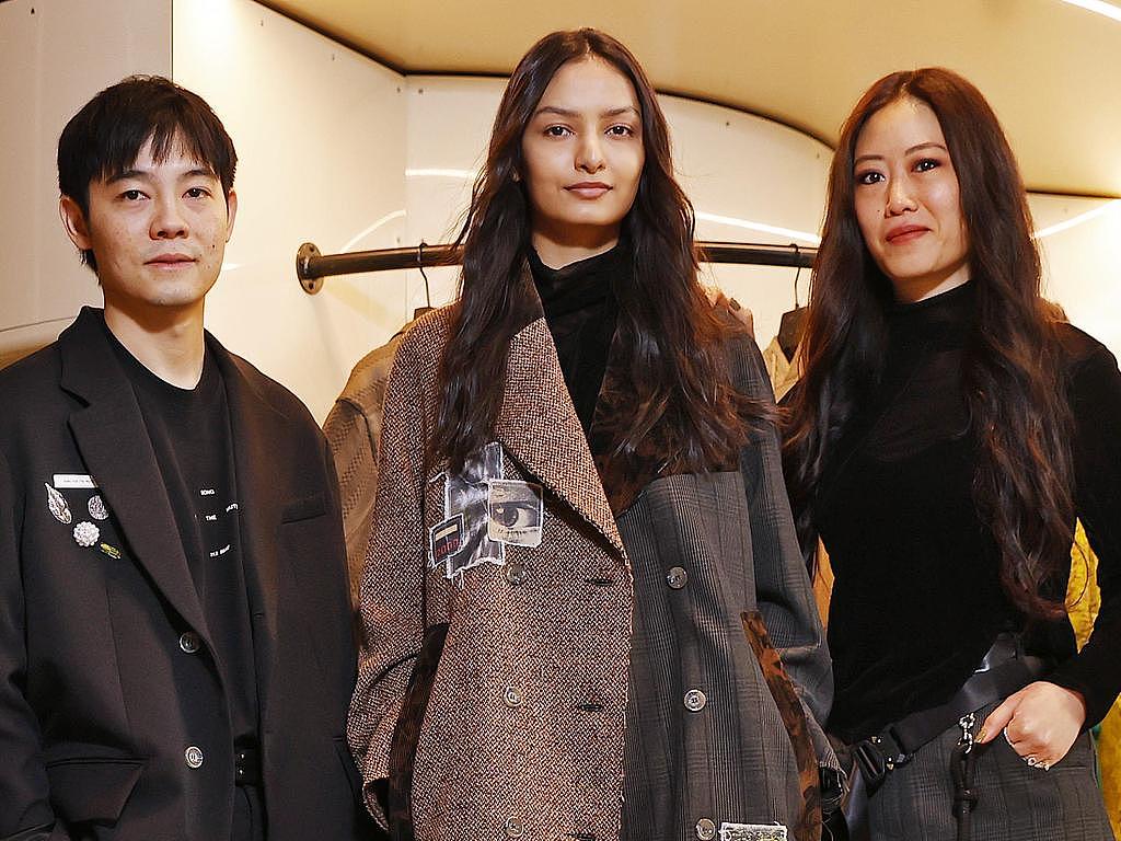 Creators of the fashion label Song for the Mute, Melvin Tanaya (left) and Lyna Ty (right) with model Jasmine Munder (centre) at their new store opening shortly in Sydney CBD. Picture: Sam Ruttyn