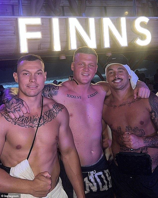Kane Bailey (centre) admitted to stealing four Viagra pills from a pharmacy in Bali. He is pictured with footy star Jayden Sullivan